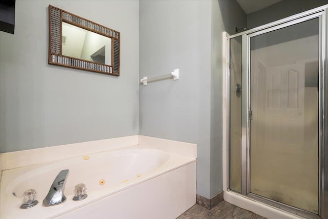 bathroom featuring plus walk in shower