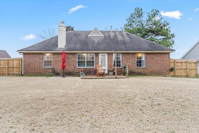 back of house featuring a patio