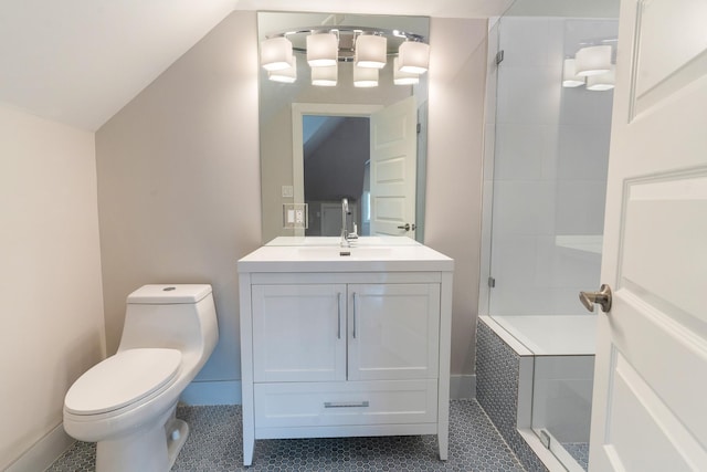 bathroom featuring vanity, vaulted ceiling, tile patterned floors, and toilet