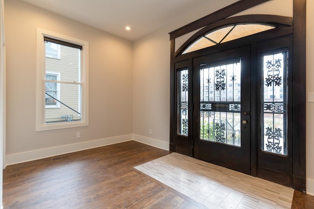 entryway featuring dark wood-type flooring