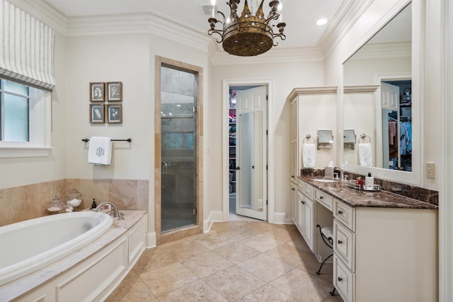 bathroom featuring crown molding, vanity, shower with separate bathtub, and a notable chandelier