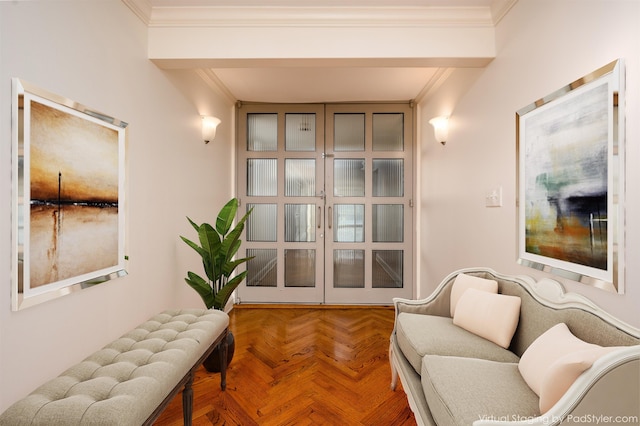 living area featuring parquet floors and ornamental molding