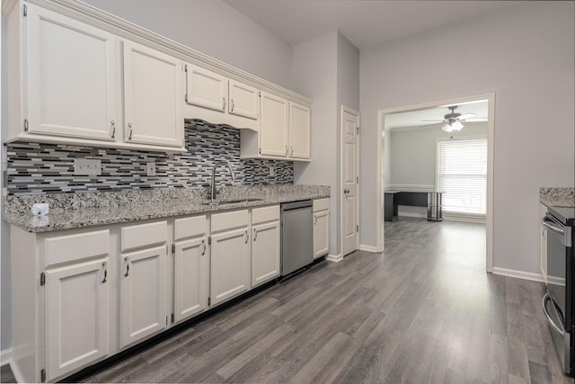 kitchen with white cabinetry, sink, tasteful backsplash, and appliances with stainless steel finishes