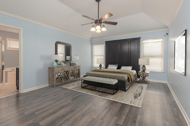 bedroom with crown molding, dark hardwood / wood-style floors, and ceiling fan