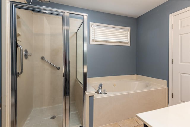 bathroom with vanity, tile patterned floors, and separate shower and tub