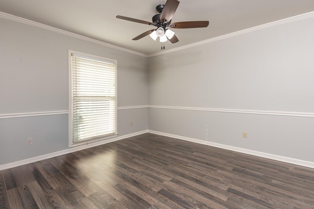 spare room with dark hardwood / wood-style flooring, ornamental molding, and ceiling fan