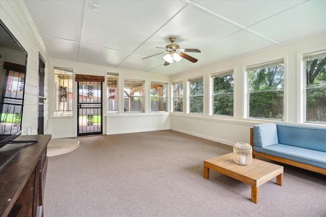 sunroom with ceiling fan