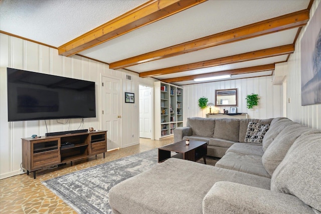 living room featuring beam ceiling