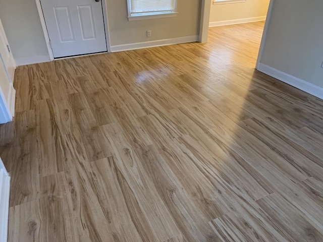 interior details featuring hardwood / wood-style flooring