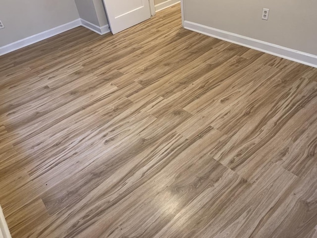 interior details featuring hardwood / wood-style floors