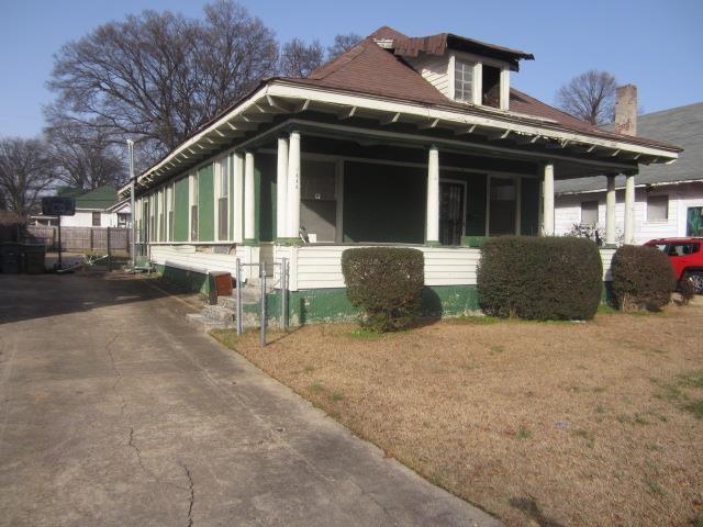 view of home's exterior featuring a lawn