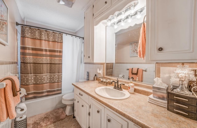 full bathroom with vanity, shower / tub combo, crown molding, tile patterned floors, and a textured ceiling