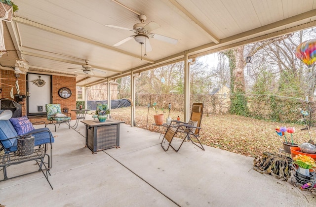 view of patio featuring an outdoor hangout area and ceiling fan