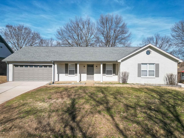 ranch-style house featuring a garage, a porch, and a front yard