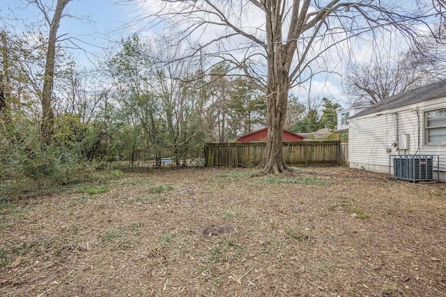 view of yard with central AC