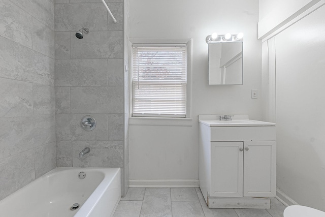 full bathroom featuring vanity, toilet, and tiled shower / bath combo