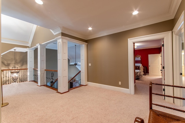 interior space with ceiling fan, carpet floors, and decorative columns