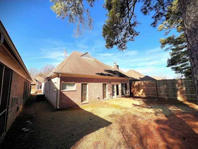 back of property with cooling unit