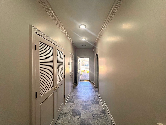 corridor featuring crown molding