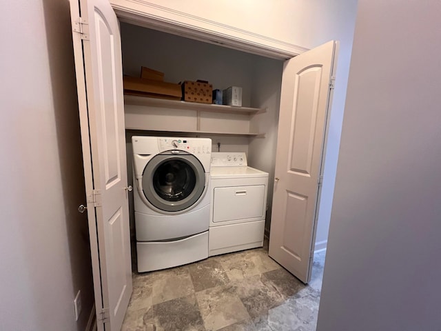 laundry room featuring washer and dryer