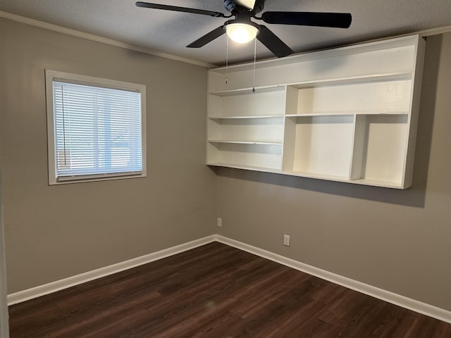 unfurnished room with dark hardwood / wood-style flooring, ceiling fan, crown molding, and a textured ceiling