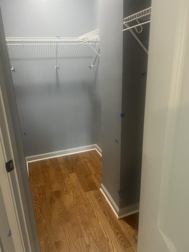153 Caldwell Ave, Memphis, TN 38107 - spacious closet with wood finished floors