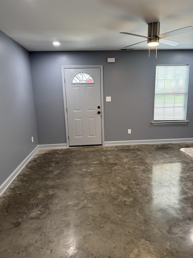 153 Caldwell Ave, Memphis, TN 38107 - entryway with healthy amount of natural light, ceiling fan, concrete flooring, and baseboards