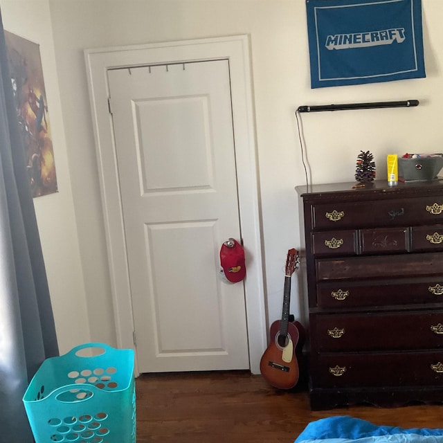 bedroom featuring dark hardwood / wood-style floors