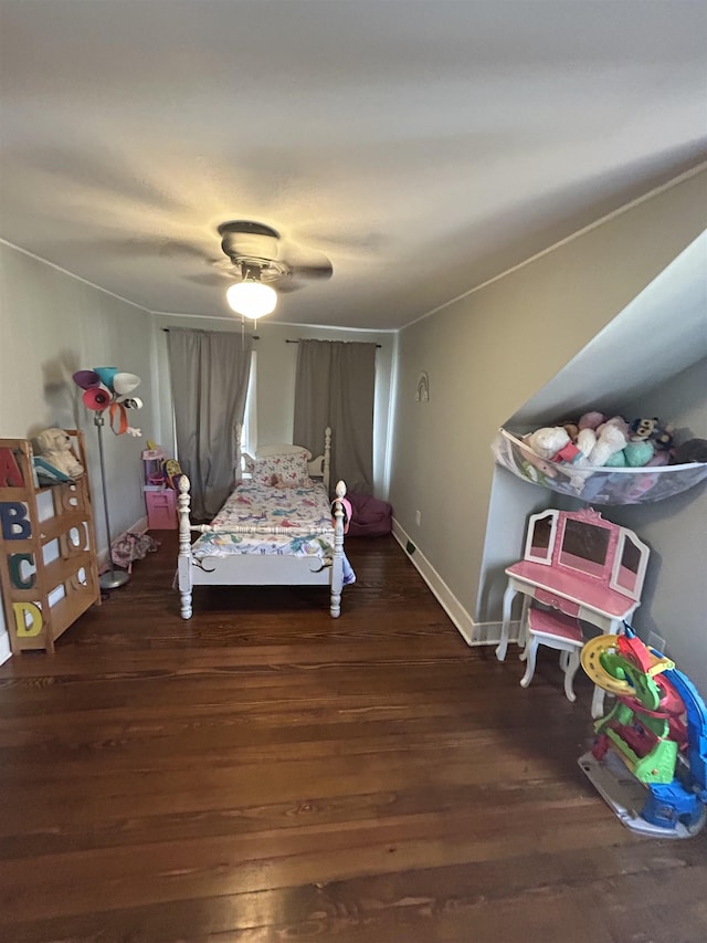 bedroom featuring dark wood-type flooring and ceiling fan