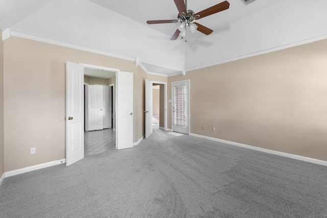 unfurnished bedroom with vaulted ceiling, ornamental molding, ceiling fan, and carpet flooring