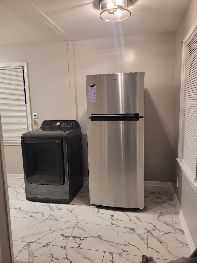 washroom featuring washer / clothes dryer