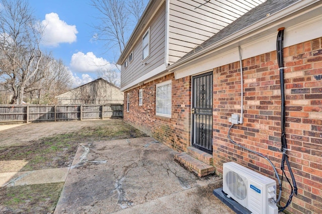 view of patio / terrace featuring ac unit