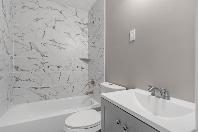 full bathroom with tiled shower / bath combo, vanity, and toilet