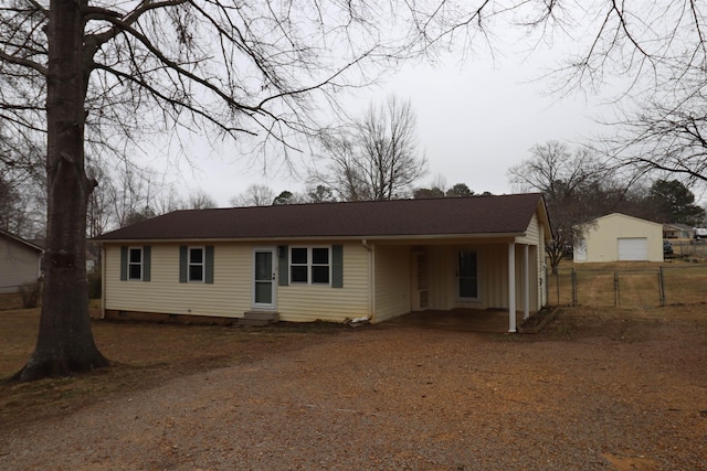 single story home featuring crawl space, fence, dirt driveway, and entry steps