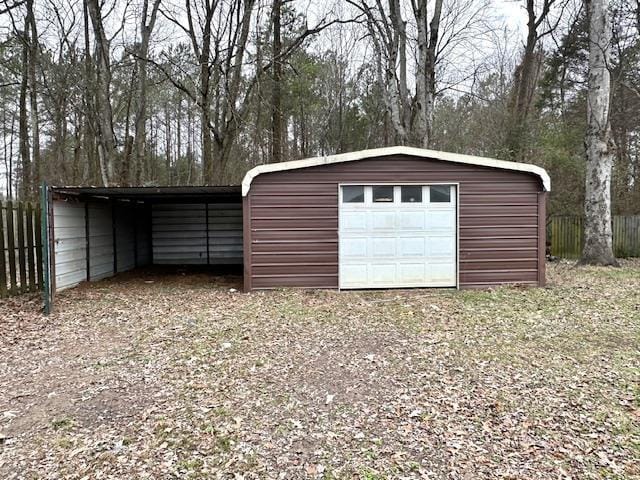 garage featuring a carport