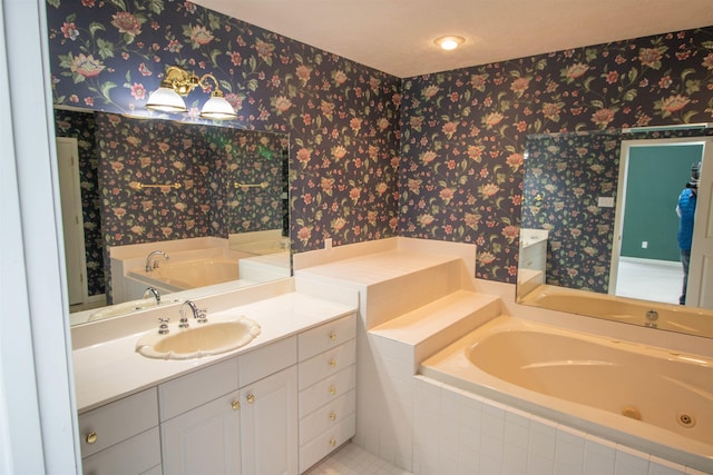 bathroom with a relaxing tiled tub and vanity