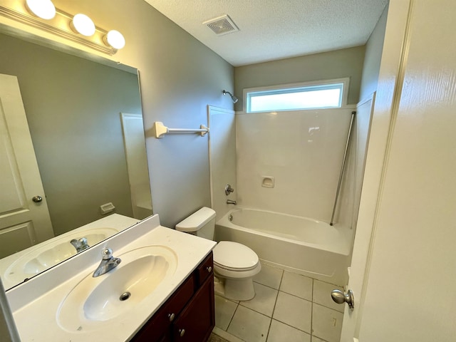 full bathroom featuring toilet, a textured ceiling, vanity, shower / bath combination, and tile patterned flooring