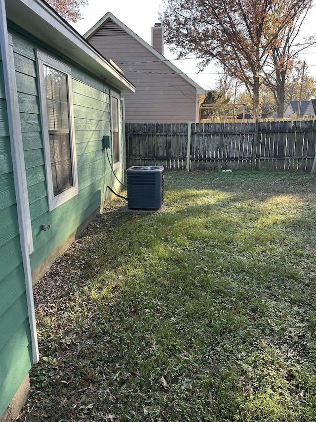 view of yard featuring central AC