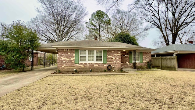 view of front of property with a carport