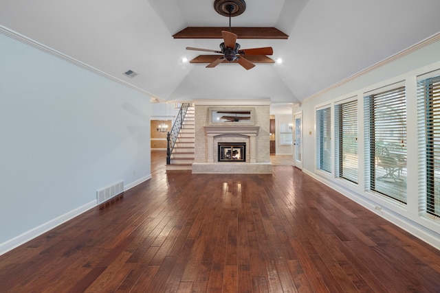 unfurnished living room with beam ceiling, ceiling fan, ornamental molding, and dark hardwood / wood-style flooring