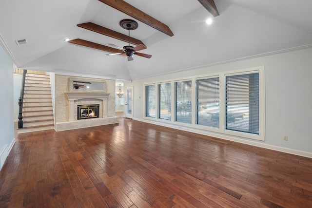 unfurnished living room featuring high vaulted ceiling, beamed ceiling, ceiling fan, a high end fireplace, and hardwood / wood-style floors