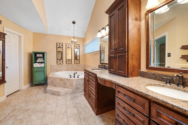 bathroom featuring lofted ceiling, vanity, a notable chandelier, a relaxing tiled tub, and tile patterned flooring