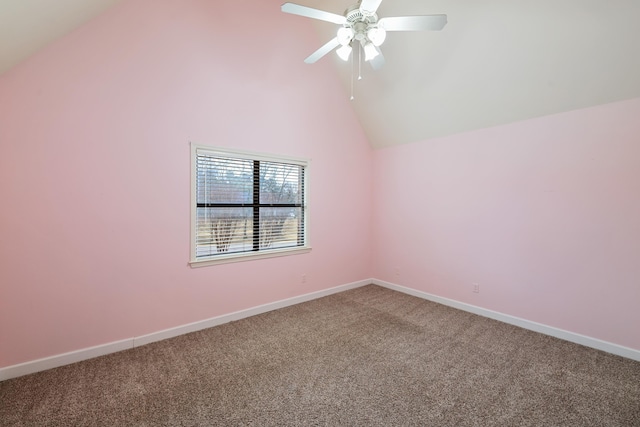 empty room with carpet, high vaulted ceiling, and ceiling fan