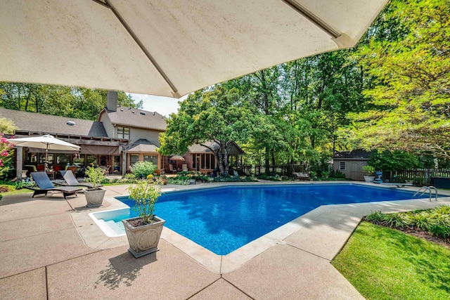 view of pool featuring a pergola and a patio area