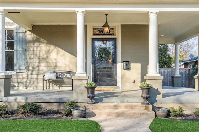 doorway to property with a porch