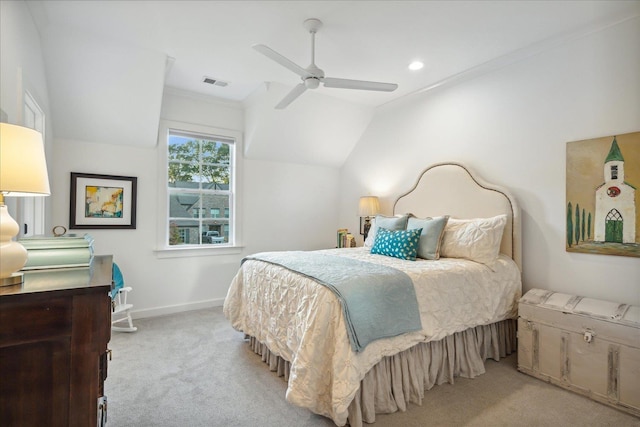 carpeted bedroom featuring vaulted ceiling, ornamental molding, and ceiling fan