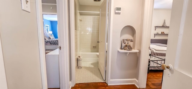 bathroom featuring washtub / shower combination