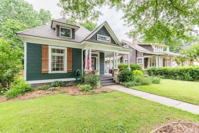 view of front facade with a porch and a front yard