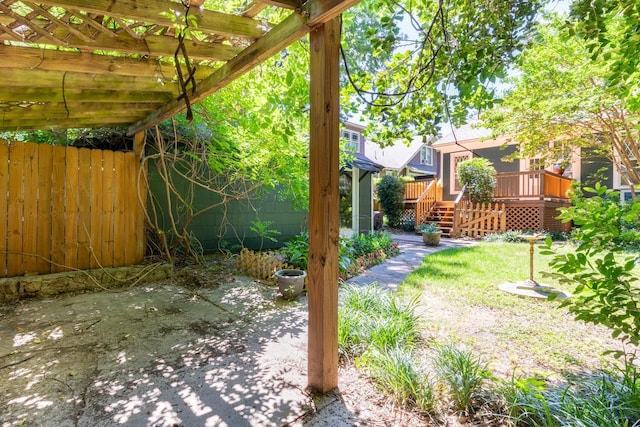 view of yard with a deck