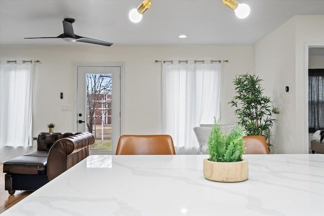 dining space with ceiling fan